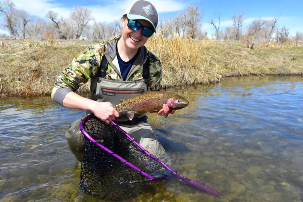 A fly fishing beginner's first catch